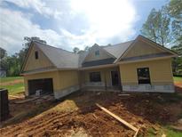 Newly constructed single Gathering home with a two car garage and horizontal siding at 877 Highway 101 N, Dallas, GA 30157
