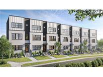 Modern townhomes feature a light gray facade, black trim, and landscaped front yards for curb appeal at 673 Soul Aly # 146, Alpharetta, GA 30009