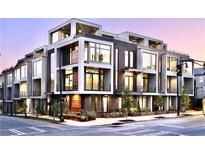 Modern townhome showcases sleek design with large windows, balconies, and contemporary architectural details in urban setting at 105 Georgia Se Ave # 7, Atlanta, GA 30312