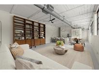 A spacious living room area has an open floor plan and industrial style elements at 830 Dekalb Ave # 1, Atlanta, GA 30307