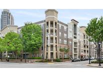 Attractive exterior view of The Element condos and apartments with a brick facade and appealing architectural details at 390 17Th Nw St # 5008, Atlanta, GA 30363