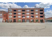 Brick exterior of building with multiple floors and large windows and street view at 346 Peters Sw St # 207, Atlanta, GA 30313