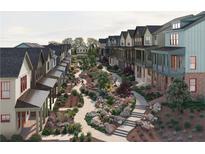 Beautiful exterior view of community townhomes with walking paths and lush landscaping at 1920 Repose Dr, Chamblee, GA 30341