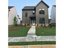 Two-story home featuring a well-kept lawn, neutral siding, and an inviting front entrance at 3472 Adler Trl, Buford, GA 30519