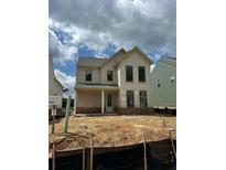 Charming two-story home under construction with a covered front porch and large windows at 3482 Adler Trl, Buford, GA 30519