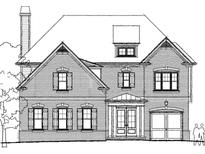 Charming brick home featuring a well-manicured front yard and attached two-car garage at 11350 Bennett Ln, Johns Creek, GA 30097