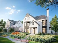 Stunning new construction home featuring white brick, black trim, and professionally landscaped yard at 1585 S Ponce De Leon #13 S Ave, Atlanta, GA 30307
