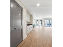 Bright, open living space with hardwood floors, custom built-ins and large windows at 1100 Howell Mill Nw Rd # 505, Atlanta, GA 30318