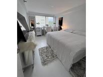 Bright bedroom featuring white walls and modern furnishings and natural light at 2479 Peachtree Rd # 503, Atlanta, GA 30305