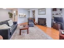 Inviting living room with hardwood floors, fireplace, and comfortable seating at 1418 Summit North Ne Dr # 1418, Atlanta, GA 30324