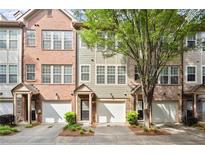 Charming townhome with attached garage and manicured landscaping at 3708 Ashford Creek Ne Hl # 3708, Atlanta, GA 30319