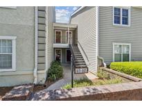 Charming condo featuring traditional architecture and well-maintained landscaping at 66 Devon Ln, Avondale Estates, GA 30002