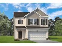 Charming two-story home featuring a brick facade, attached two-car garage, and meticulously manicured lawn at 1315 Elowen Dr, Austell, GA 30168