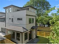 Beautiful three-story home with a well-maintained yard and modern siding at 88 Cleveland Unit B Se St, Atlanta, GA 30316