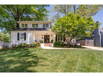 Charming two-story home with a well-manicured front yard and inviting curb appeal at 26 Kensington Rd, Avondale Estates, GA 30002