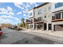 Modern townhome exterior with balconies and garages, offering contemporary living at 2335 Mason Dr # D27, Atlanta, GA 30316