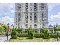 Elegant high-rise building featuring multiple balconies and manicured landscaping at 199 14Th Ne St # 710, Atlanta, GA 30309