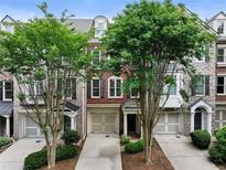 Charming brick townhome with well-manicured landscaping and private entrances at 11187 Calypso Dr # 12, Alpharetta, GA 30009