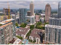 Incredible aerial view of the building and the city skyline at 1075 Peachtree Ne Walk # A204, Atlanta, GA 30309