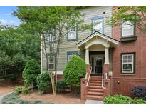 Charming two-story townhome features a brick facade and inviting entrance at 655 Mead Se St # 79, Atlanta, GA 30312