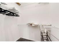 A spacious walk-in closet with wire shelving perfect for organizing clothes and linens at 130 Arizona Ne Ave # 104, Atlanta, GA 30307