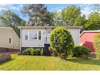 Charming single-story home with a well-maintained lawn and mature landscaping at 286 Booker Sw St, Atlanta, GA 30315