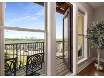 Cozy balcony with a wrought iron bench offering scenic city views, perfect for relaxation at 1195 Milton Ter # 1304, Atlanta, GA 30315