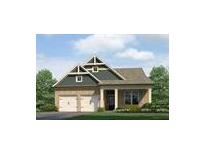 Charming single-story home with a two-car garage and inviting front porch at 121 Maplewood Ln, Conyers, GA 30094