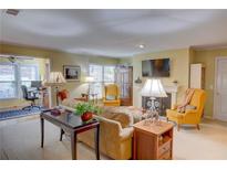 Comfortable living room with a fireplace, television, and abundant seating arrangement at 500 Bainbridge Dr, Atlanta, GA 30327