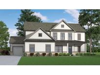 Charming two-story home featuring neutral siding, a covered front porch, and well-maintained landscaping at 1100 Cottonwood Ln, Loganville, GA 30052