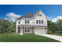 Charming two-story home featuring a mix of brick and vertical siding, complemented by a well-manicured lawn at 4850 Summerchase Ln, Cumming, GA 30028