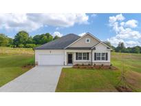 Charming single-story home with a well-manicured lawn and attached garage in a desirable location at 648 Kimberwick Dr, Locust Grove, GA 30248