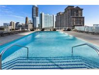 Rooftop pool offers city views and comfortable lounge seating perfect for relaxation and entertainment at 3325 Piedmont Ne Rd # 3005, Atlanta, GA 30305