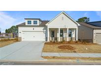 Charming single-Gathering home boasting a two-car garage and covered porch at 1610 Savoy Way Way, Loganville, GA 30052
