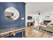 Bright living room with hardwood floors, stylish decor, and plenty of natural light at 1750 Clairmont Rd # 32, Decatur, GA 30033