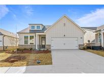 Charming single-Gathering home boasting a two-car garage and attractive curb appeal at 1682 Juniper Berry Way, Loganville, GA 30052