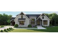 Beautiful new construction home featuring a paved driveway, landscaping, and attractive gray exterior at 2468 Rockbridge Nw Rd, Conyers, GA 30012