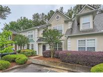 Charming townhouse featuring well-manicured landscaping and neutral exterior paint at 3733 Sidney Lanier Blvd, Duluth, GA 30096