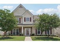 Charming two-story home featuring a well-manicured lawn and inviting brick accents at 1840 Brighton Se Blvd, Atlanta, GA 30316