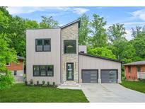 Modern two-story home with stone accents, two-car garage, and stylish curb appeal at 2318 Polar Rock Terrace, Atlanta, GA 30315