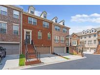 Brick townhomes offer classic design and curb appeal at 2690 Derby Ne Walk # 53, Atlanta, GA 30319