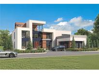 Stunning modern home with large windows, a manicured lawn, and a circular driveway at 7504 Rivertown Rd, Fairburn, GA 30213
