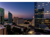 Stunning city view at twilight, showcasing modern high-rise buildings and the vibrant urban skyline at 3324 Peachtree Ne Rd # 1407, Atlanta, GA 30326