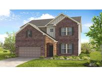 Charming two-story brick home featuring a stone-accented entryway and a well-manicured lawn at 3269 Shirecrest Ln, Dacula, GA 30019