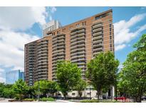 Stunning exterior view of a modern condo building with private balconies and city views at 620 Peachtree Ne St # 1716, Atlanta, GA 30308