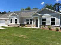 Charming single-story home with tidy landscaping and a welcoming front porch at 3708 Cheswolde Ave, Powder Springs, GA 30127