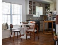Cozy kitchen nook features a breakfast table, and lots of natural light from the window at 1320 Country Acres Ln, Lawrenceville, GA 30045