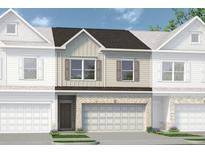 Charming townhome showcasing a brick facade and a convenient two-car garage at 1234 Ravencliff Dr # 81, Austell, GA 30168