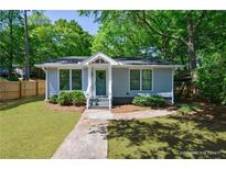 Charming single-story home with a well-maintained front yard and inviting entrance at 1314 Arkwright Se Pl, Atlanta, GA 30317