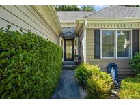 Charming home entrance with a beautiful door and manicured landscaping, offering an inviting curb appeal at 2191 Flowering Dr, Grayson, GA 30017
